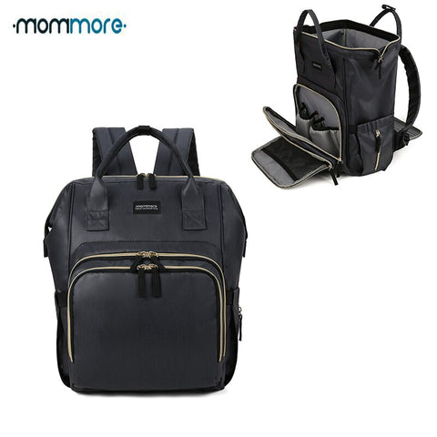 Sac à dos à langer <br> avec tapis intégré